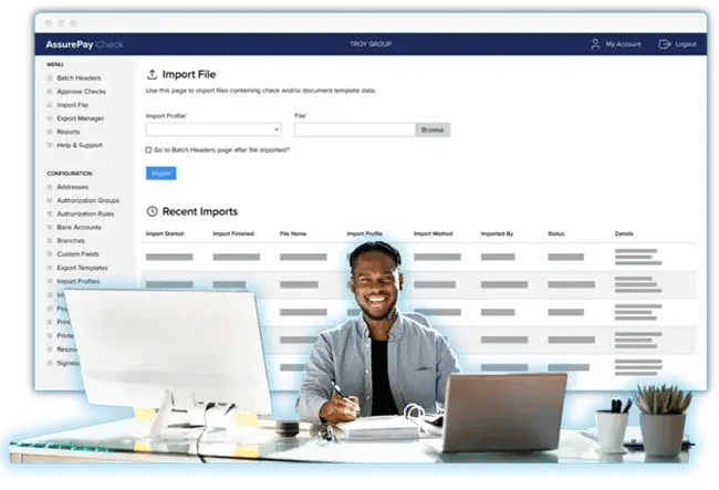 AssurePay Check software screen with man at desk