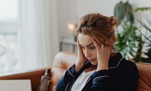Frustrated woman after using neobank