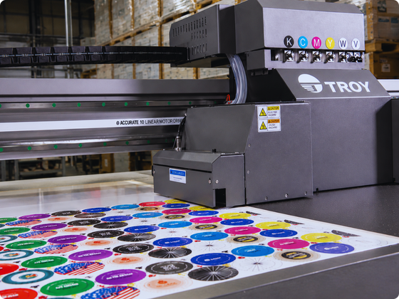 Printing UV curable ink on coated metal
