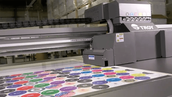 UV Flatbed printer printing on caps and closures