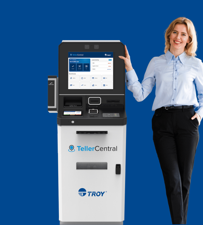 Woman standing next to TellerCentral machine