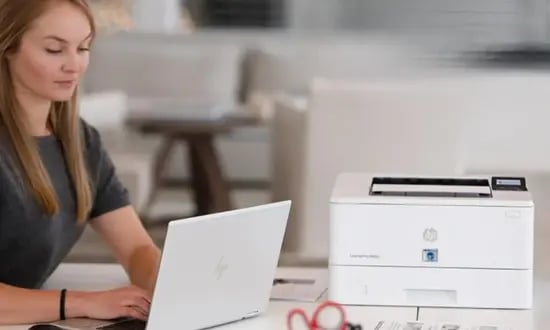 Woman with using TROY MICR Printer 