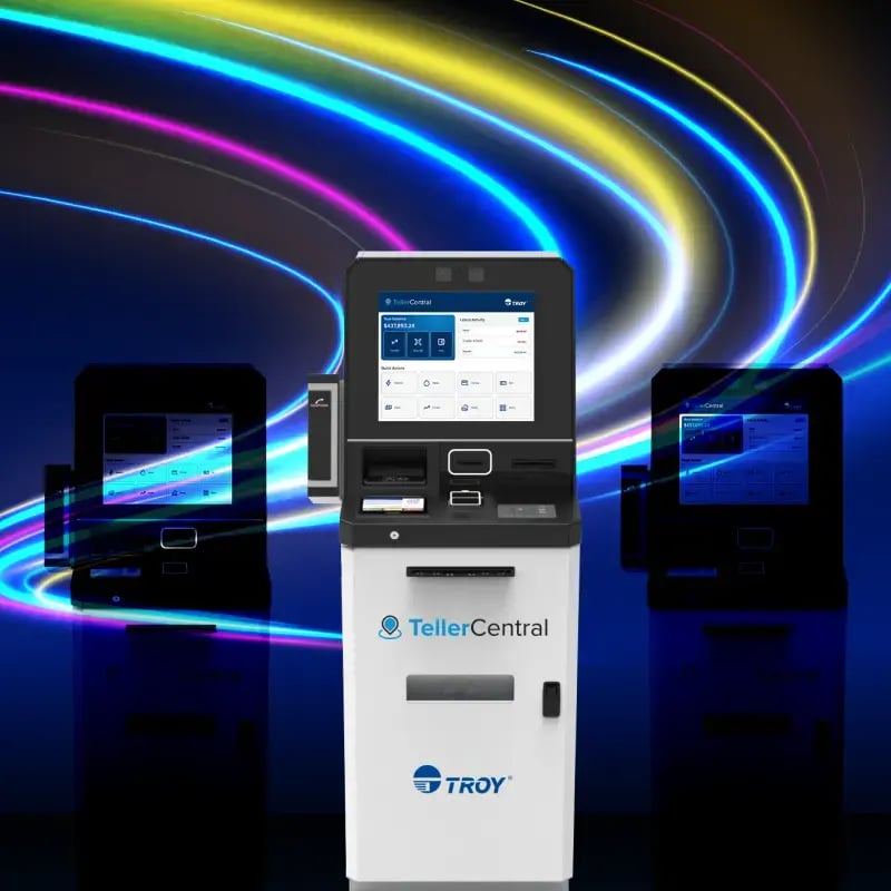 Self-service kiosks in front of colorful light swirls