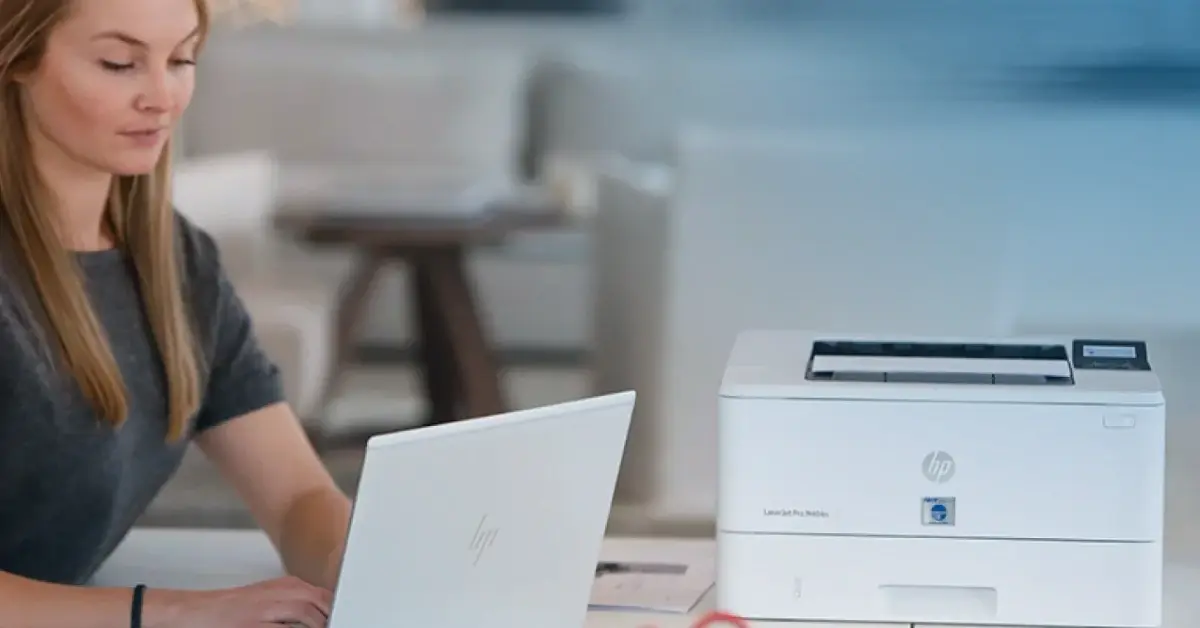 Woman with desktop TROY MICR Printer